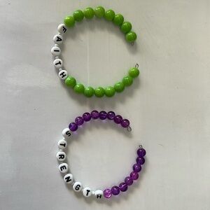 Glass beaded bracelets. Purple and green.